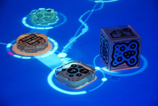 Illustration for article titled ReacTable Synth Makes Touchy-Feely Music for your Eyes